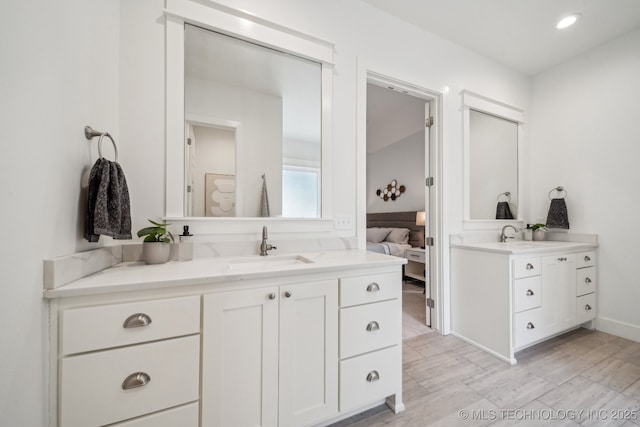 1038 E 38th Pl, Tulsa, OK 74105 - full bathroom featuring two vanities, ensuite bath, and recessed lighting