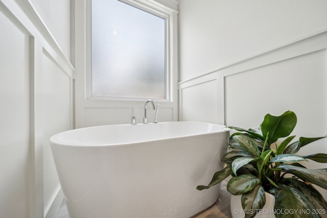 1038 E 38th Pl, Tulsa, OK 74105 - full bathroom featuring a freestanding tub