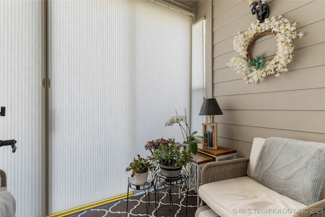 7724 S 83rd E Ave, Tulsa, OK 74133 - living area featuring wood walls