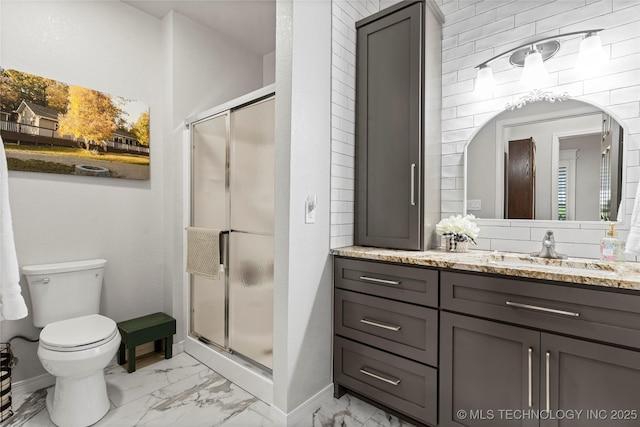 7724 S 83rd E Ave, Tulsa, OK 74133 - bathroom with marble look tiles, vanity, a stall shower, and baseboards