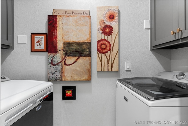 7724 S 83rd E Ave, Tulsa, OK 74133 - laundry area featuring cabinet space and independent washer and dryer