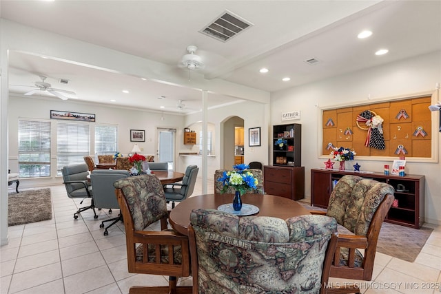 7724 S 83rd E Ave, Tulsa, OK 74133 - dining space featuring a ceiling fan, arched walkways, light tile patterned floors, recessed lighting, and beamed ceiling