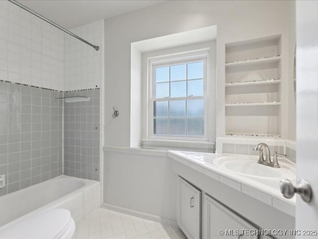 5339 S 32nd W Ave, Tulsa, OK 74107 - bathroom featuring vanity, toilet, shower / bath combination, and tile patterned flooring