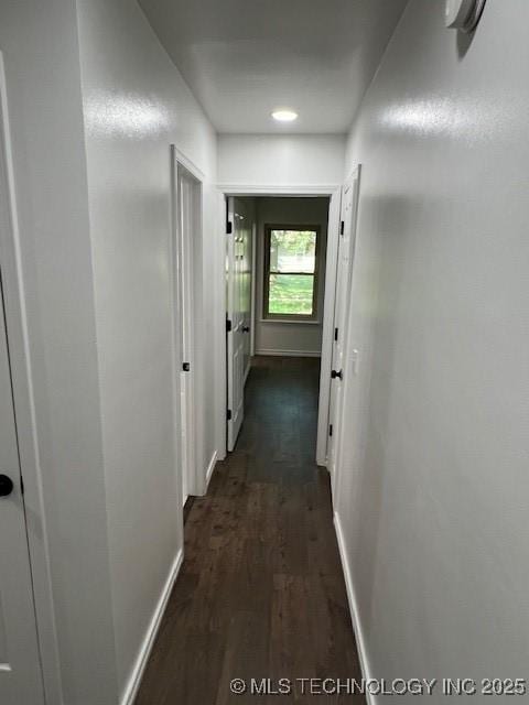 1800 N 26th St, Broken Arrow, OK 74014 - hallway featuring dark wood-style floors and baseboards