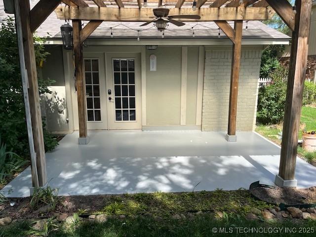 1800 N 26th St, Broken Arrow, OK 74014 - view of patio with french doors, a pergola, and ceiling fan