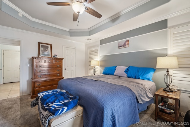 11210 N 131st E Pl, Owasso, OK 74055 - bedroom featuring carpet, crown molding, a tray ceiling, ceiling fan, and baseboards