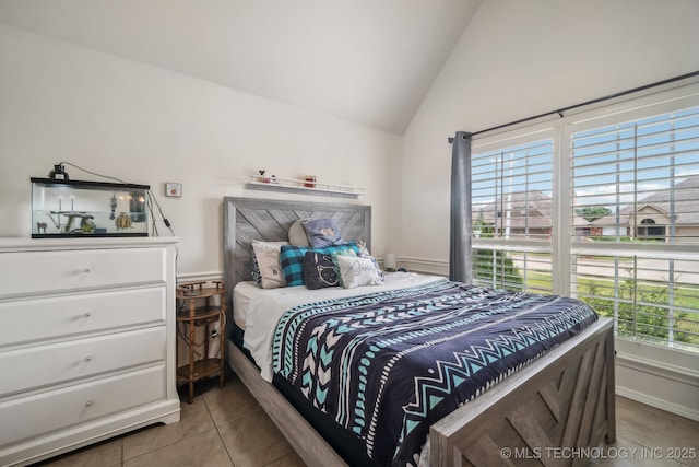 11210 N 131st E Pl, Owasso, OK 74055 - bedroom with tile patterned floors and high vaulted ceiling