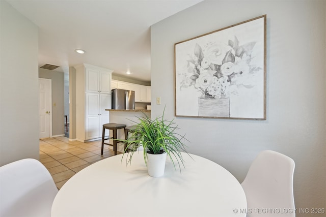 5144 S 34th W Ave, Tulsa, OK 74107 - dining area featuring recessed lighting and light tile patterned flooring