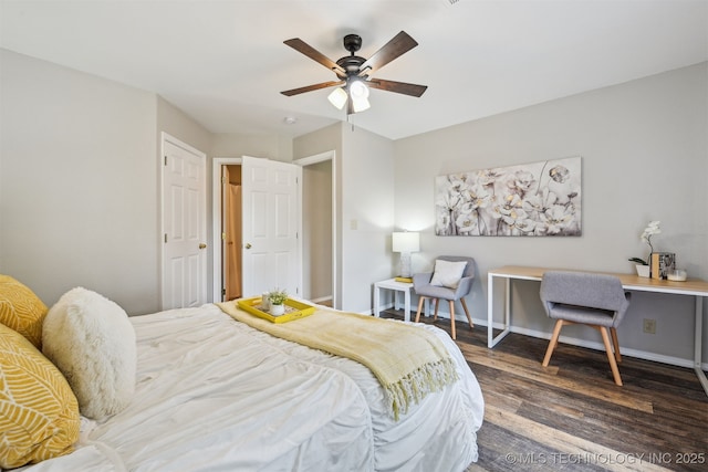 5144 S 34th W Ave, Tulsa, OK 74107 - bedroom featuring wood finished floors, baseboards, and ceiling fan
