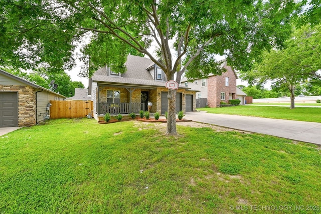 5144 S 34th W Ave, Tulsa, OK 74107 - view of front of property with concrete driveway, stone siding, and covered porch