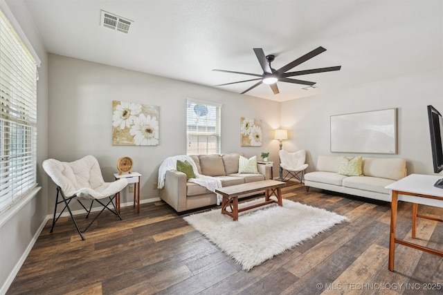5144 S 34th W Ave, Tulsa, OK 74107 - living room featuring ceiling fan, dark wood-style floors, and baseboards