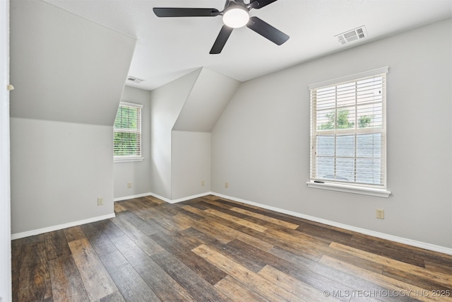 5144 S 34th W Ave, Tulsa, OK 74107 - additional living space featuring hardwood / wood-style flooring, baseboards, a ceiling fan, and vaulted ceiling