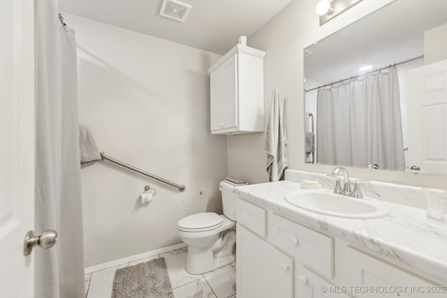 1309 W Missouri Ave, Claremore, OK 74019 - bathroom featuring vanity, toilet, marble finish flooring, baseboards, and a shower with shower curtain