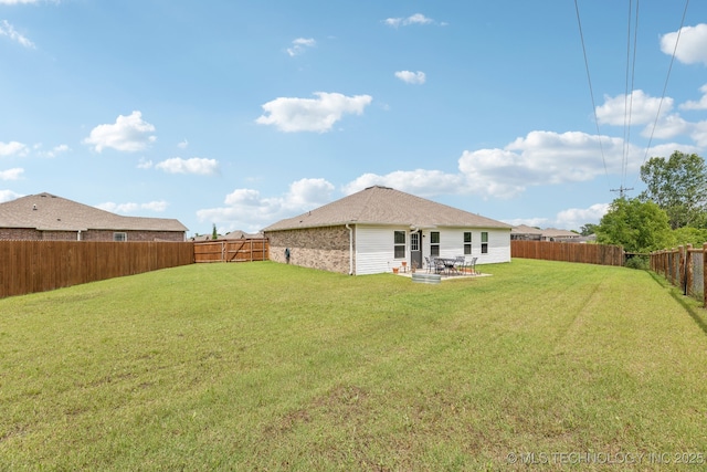 1309 W Missouri Ave, Claremore, OK 74019 - back of house with a patio
