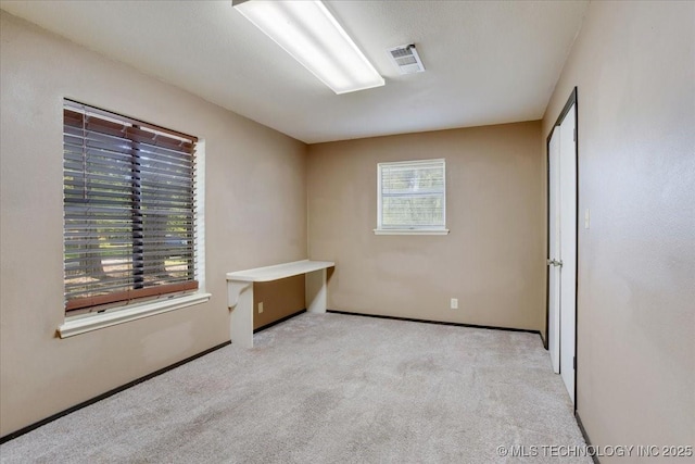 211 Meadowlark, Durant, OK 74701 - unfurnished bedroom with carpet and baseboards