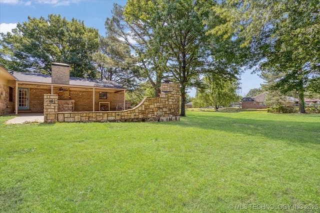 211 Meadowlark, Durant, OK 74701 - view of green lawn featuring a patio area and a ceiling fan