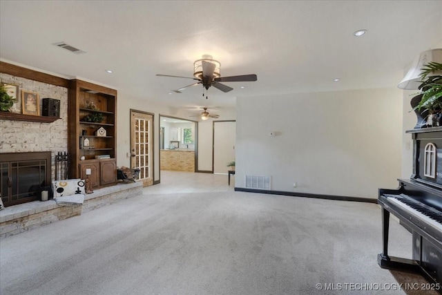 211 Meadowlark, Durant, OK 74701 - unfurnished living room with carpet flooring, a fireplace, baseboards, ceiling fan, and recessed lighting