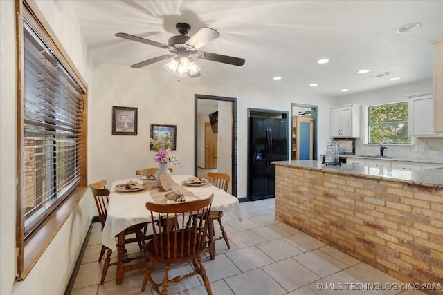 211 Meadowlark, Durant, OK 74701 - dining area with light tile patterned floors, ceiling fan, and recessed lighting