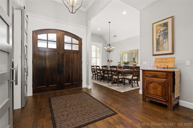 1580 Dawson Dr, Fort Gibson, OK 74434 - entrance foyer with a chandelier, dark wood finished floors, recessed lighting, ornamental molding, and baseboards