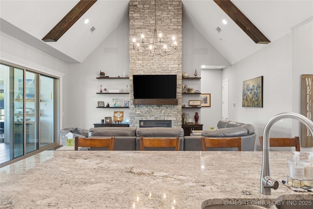1580 Dawson Dr, Fort Gibson, OK 74434 - living room with high vaulted ceiling, a fireplace, beam ceiling, and recessed lighting