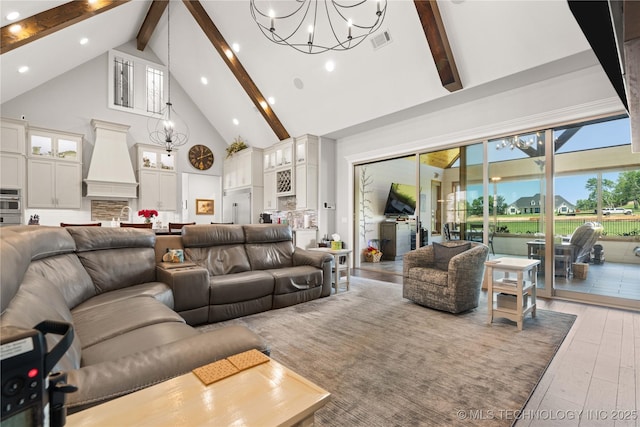 1580 Dawson Dr, Fort Gibson, OK 74434 - living room with high vaulted ceiling, a chandelier, beamed ceiling, recessed lighting, and light wood-style flooring