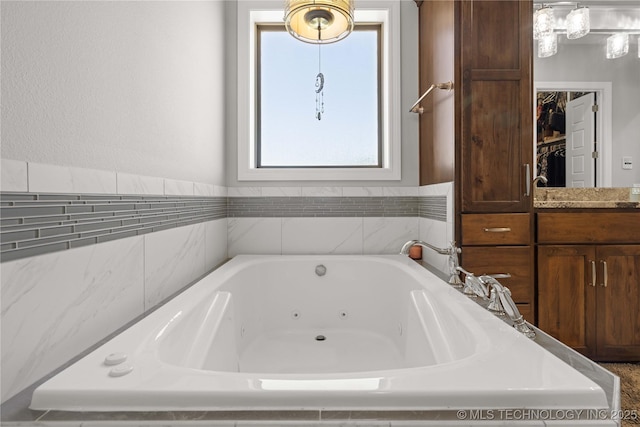 1580 Dawson Dr, Fort Gibson, OK 74434 - full bath with a tub with jets and vanity