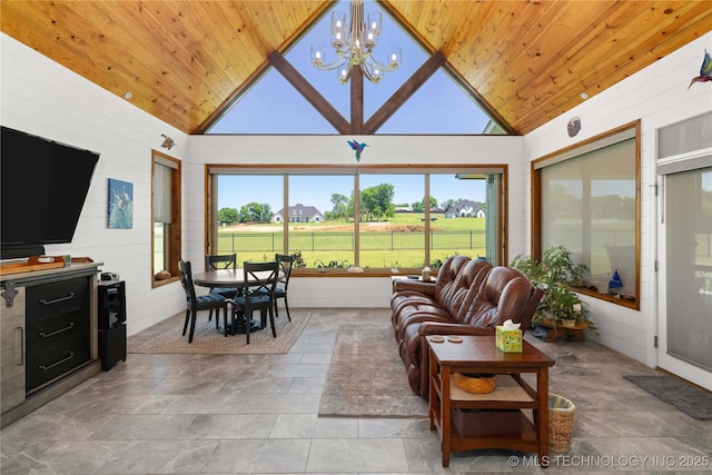 1580 Dawson Dr, Fort Gibson, OK 74434 - living area with vaulted ceiling, wood ceiling, a chandelier, and stone finish floors