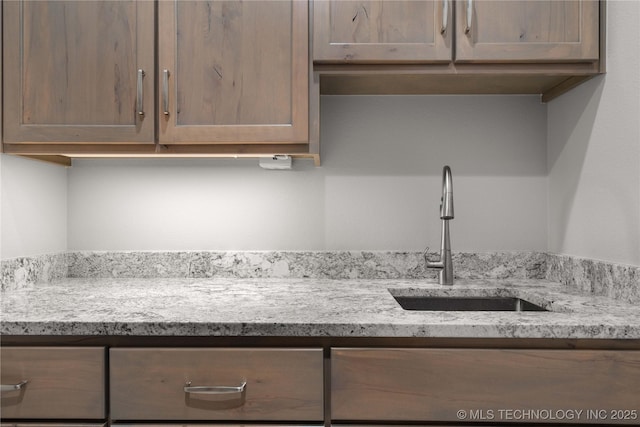 1580 Dawson Dr, Fort Gibson, OK 74434 - kitchen featuring a sink and light stone counters