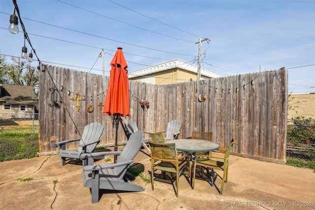 1224 S Columbia Pl, Tulsa, OK 74104 - view of patio with outdoor dining area