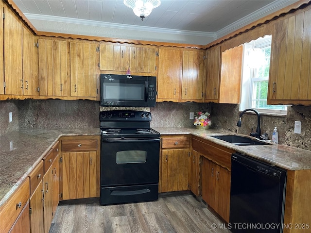 422 N Forest St, Jenks, OK 74037 - kitchen featuring black appliances, a sink, crown molding, tasteful backsplash, and brown cabinetry