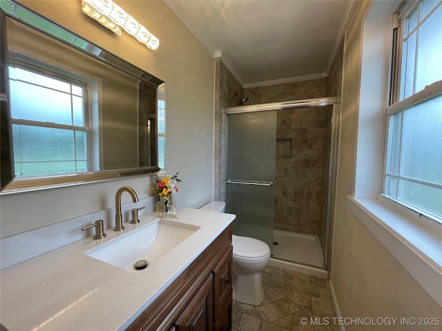 422 N Forest St, Jenks, OK 74037 - full bath featuring crown molding, toilet, vanity, a shower stall, and stone finish floors