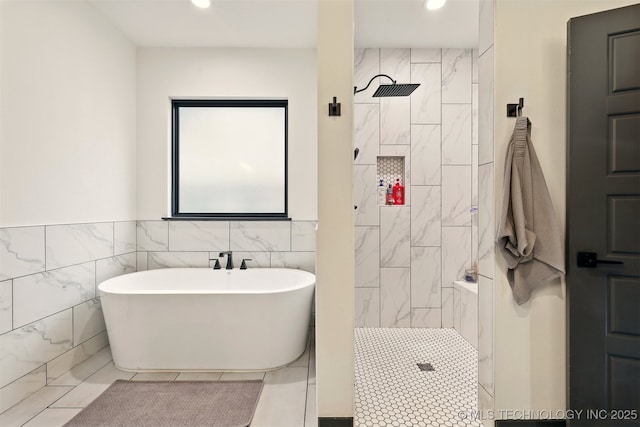 5807 E 128th St S, Bixby, OK 74008 - bathroom with a freestanding tub, tiled shower, tile walls, and recessed lighting