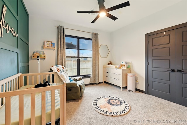 5807 E 128th St S, Bixby, OK 74008 - bedroom featuring a nursery area, carpet, a ceiling fan, and baseboards