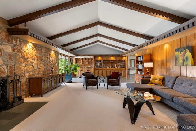 6232 S Jamestown Ave, Tulsa, OK 74136 - living room featuring wooden walls, carpet floors, and built in shelves