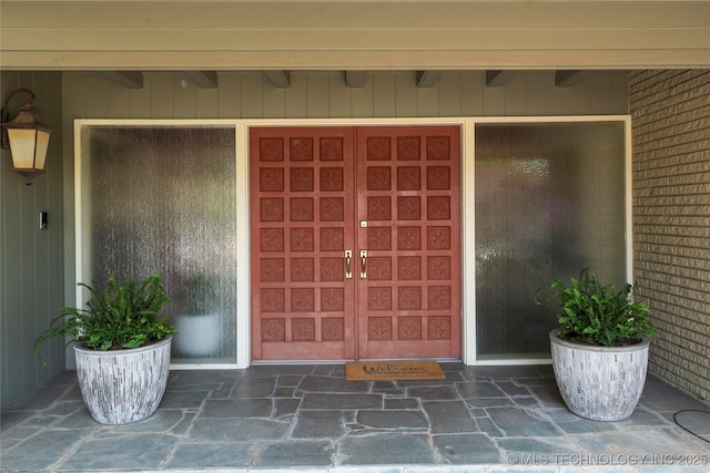 6232 S Jamestown Ave, Tulsa, OK 74136 - doorway to property featuring a garage