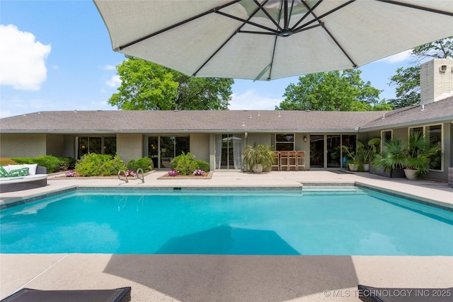 6232 S Jamestown Ave, Tulsa, OK 74136 - swimming pool featuring a patio area