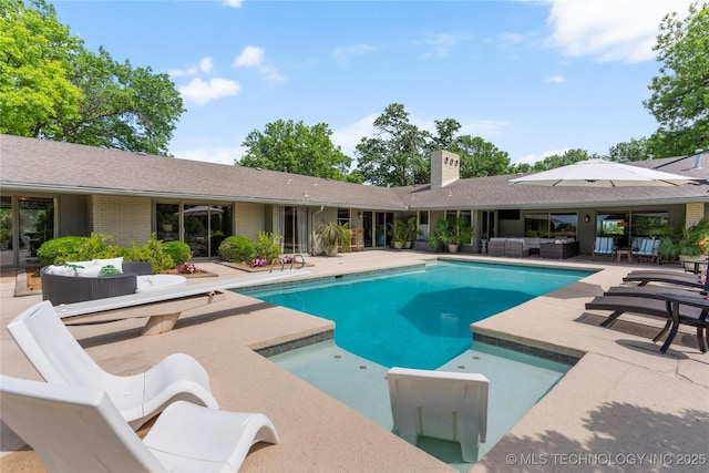 6232 S Jamestown Ave, Tulsa, OK 74136 - outdoor pool with an outdoor hangout area and a patio