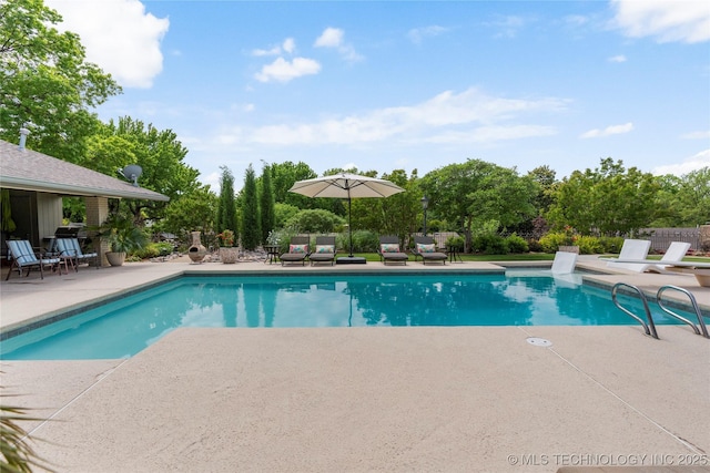 6232 S Jamestown Ave, Tulsa, OK 74136 - swimming pool featuring a patio and an outdoor living space