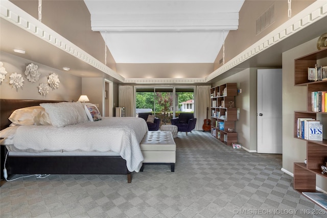 6232 S Jamestown Ave, Tulsa, OK 74136 - carpeted bedroom featuring beamed ceiling, baseboards, and high vaulted ceiling