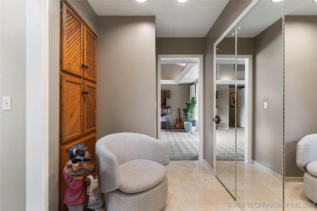 6232 S Jamestown Ave, Tulsa, OK 74136 - sitting room with light colored carpet, baseboards, light tile patterned floors, and recessed lighting