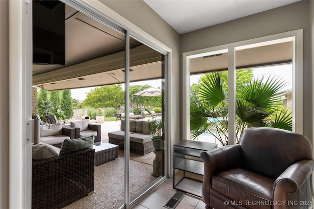 6232 S Jamestown Ave, Tulsa, OK 74136 - sunroom with healthy amount of natural light