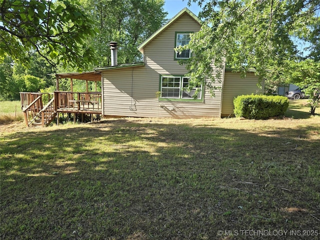5581 36700th Rd, Terlton, OK 74081 - back of house with a deck, a lawn, and stairs