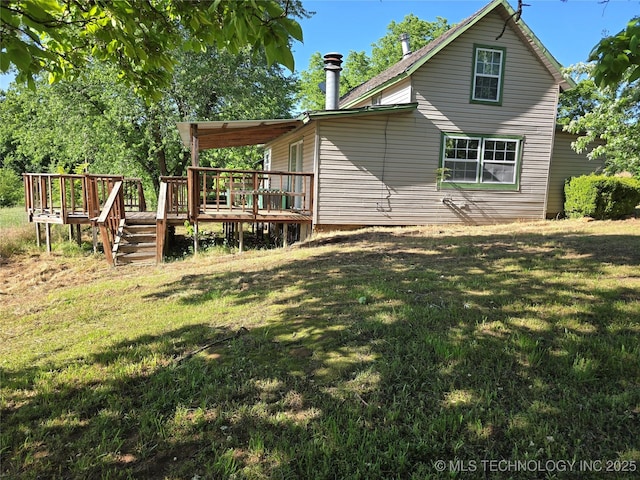 5581 36700th Rd, Terlton, OK 74081 - rear view of house with a deck and a yard
