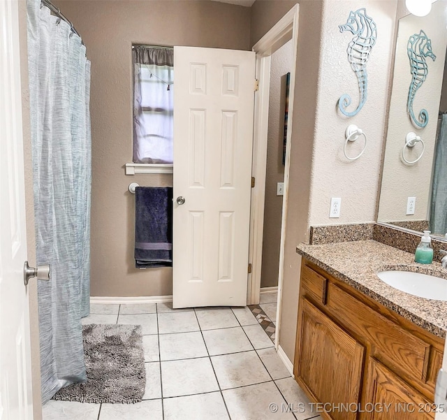 418847 E 1208th Rd, Eufaula, OK 74432 - full bathroom with vanity, tile patterned flooring, and baseboards