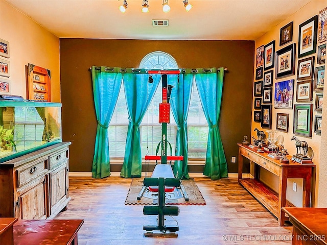 418847 E 1208th Rd, Eufaula, OK 74432 - exercise area with wood finished floors and baseboards