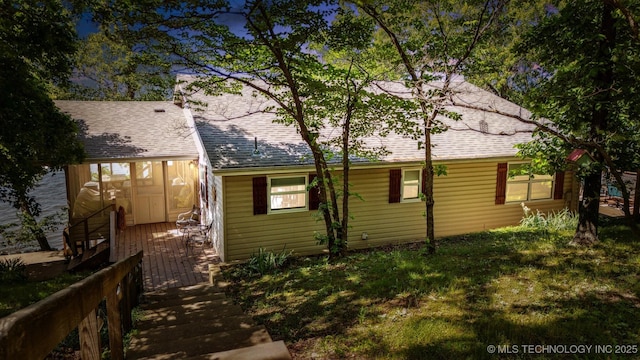 55890 E 315th Rd, Jay, OK 74346 - view of side of property featuring roof with shingles and a yard