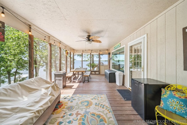 55890 E 315th Rd, Jay, OK 74346 - sunroom with ceiling fan, plenty of natural light, and a water view