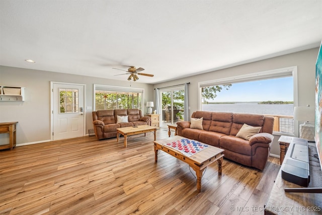 55890 E 315th Rd, Jay, OK 74346 - living room with light wood-style floors, a ceiling fan, recessed lighting, and baseboards