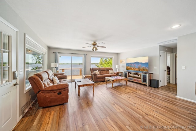 55890 E 315th Rd, Jay, OK 74346 - living room with light wood-style flooring, ceiling fan, and recessed lighting