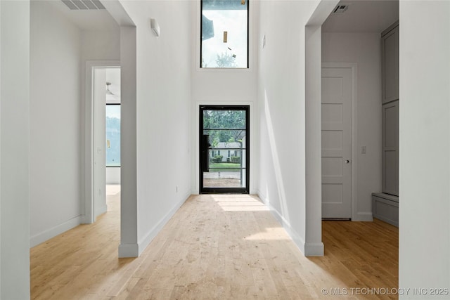 3917 S Madison Ave, Tulsa, OK 74105 - foyer with light wood-type flooring and baseboards